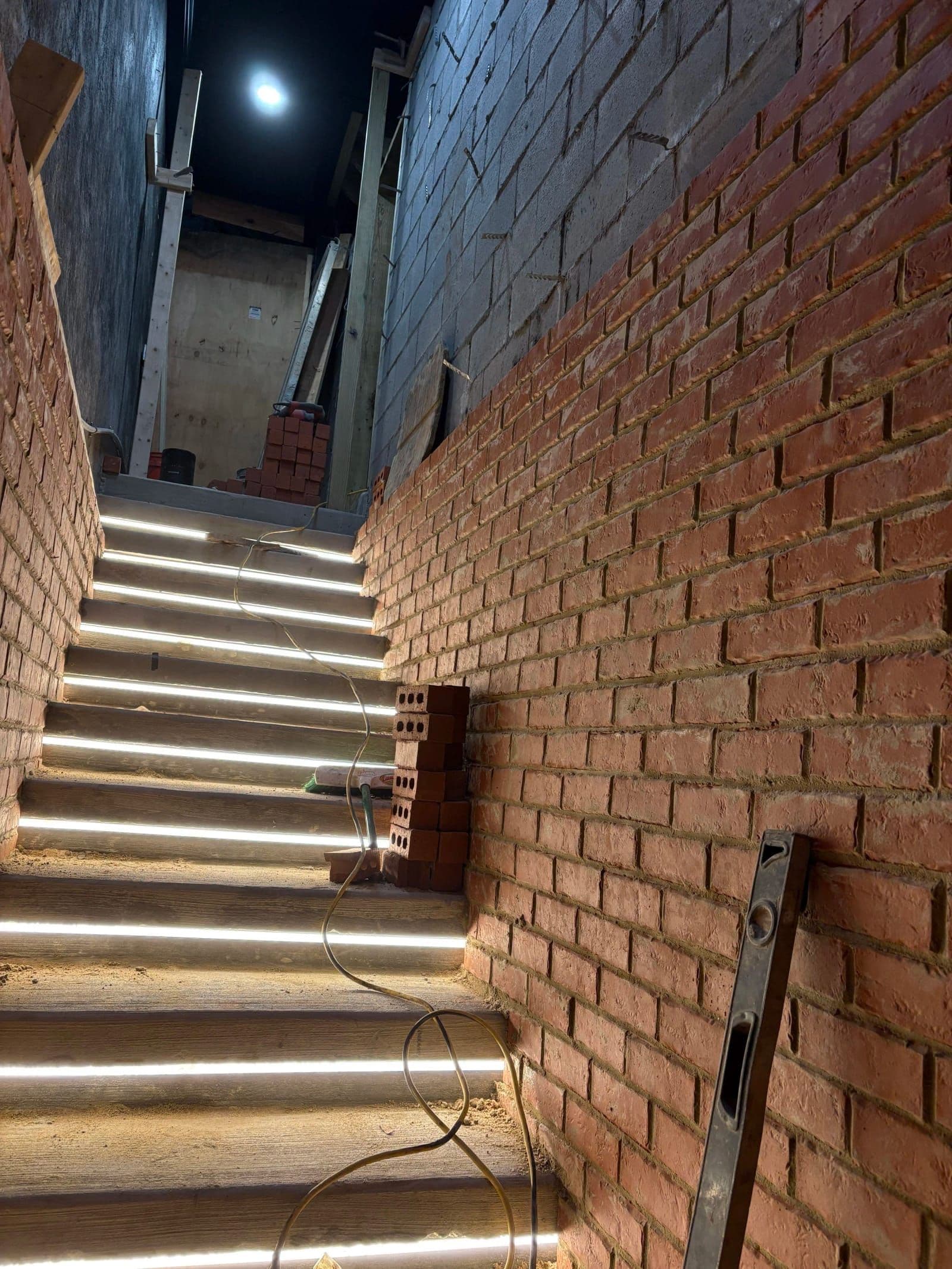 Brick staircase under construction showing skilled masonry work